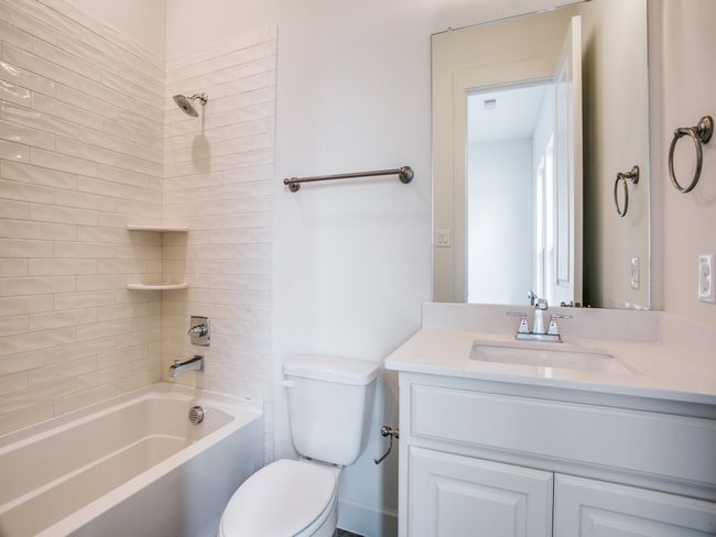 Bathroom with vanity and tub / shower combination | Image 24