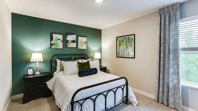 Another of the four bedrooms on the upper level of the home. | Image 32