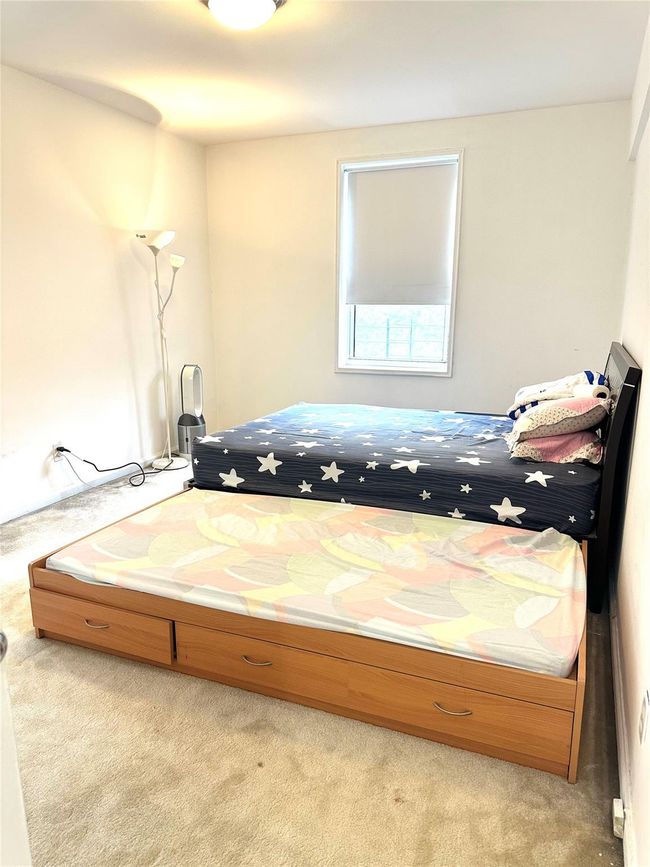 Bedroom with light colored carpet | Image 4