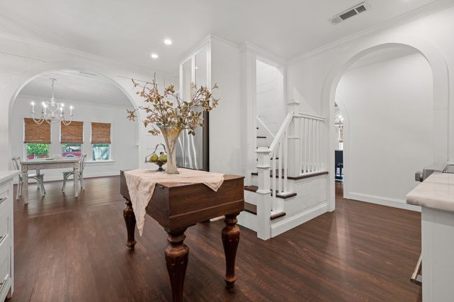 arched walkways, stairway, recessed lighting, and crown molding | Image 15