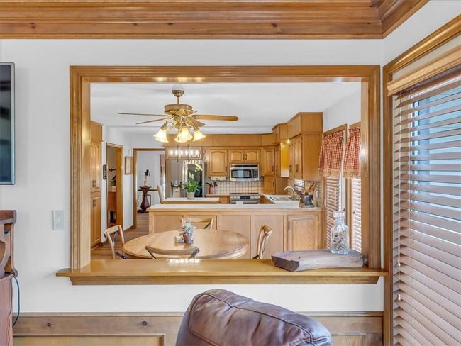 Living Room, looking into Breakfast Area & Kitchen | Image 16