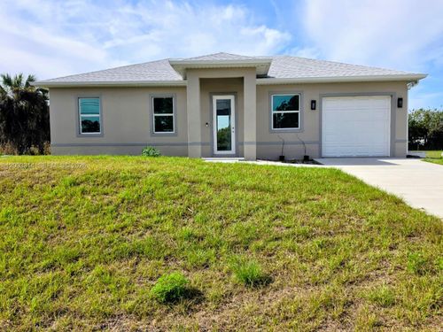 402 Harrison Dr, Lehigh Acres, FL, 33936-7804 | Card Image