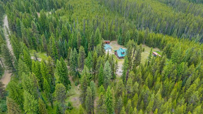 View of subject property with a forest | Image 18