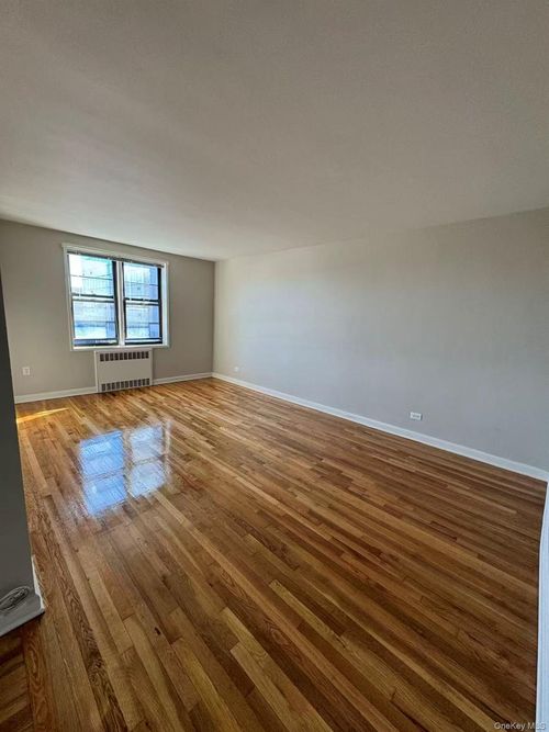 c14-9963 66th Ave, Rego Park, NY, 11374-3627 | Card Image