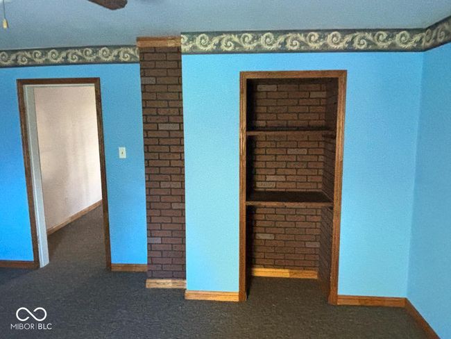 carpeted spare room with baseboards | Image 4