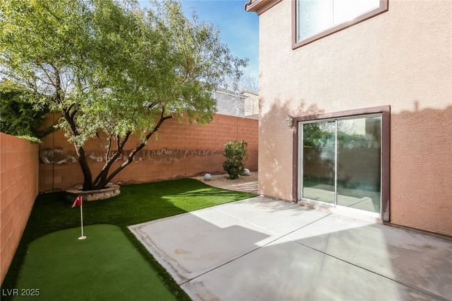 View of yard featuring a patio and a fenced backyard | Image 14