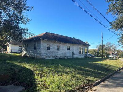 View of side of home featuring a yard | Image 2