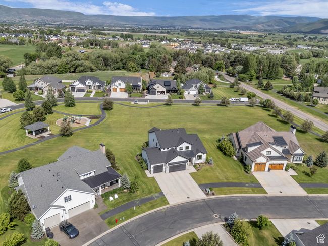 Aerial perspective of suburban area with a mountain backdrop | Image 61