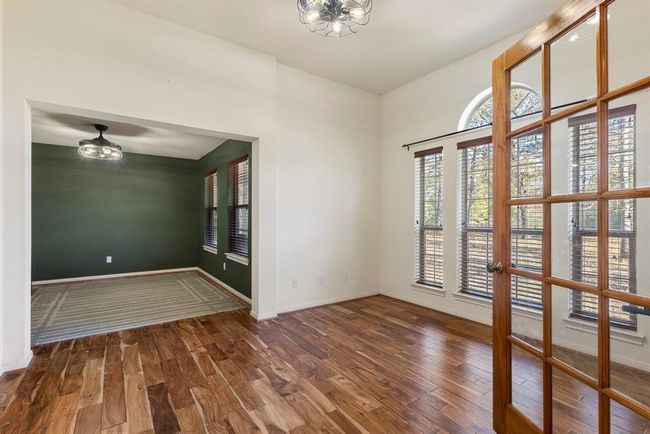 This space greets you at the entry of the home - could be used as a formal dining room, office, or game room. | Image 5