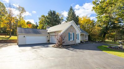 1207 W Dawson Road, Home with 4 bedrooms, 2 bathrooms and null parking in Milford Twp MI | Image 3