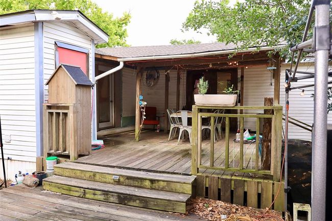 Relaxing outdoor covered patio space. | Image 6