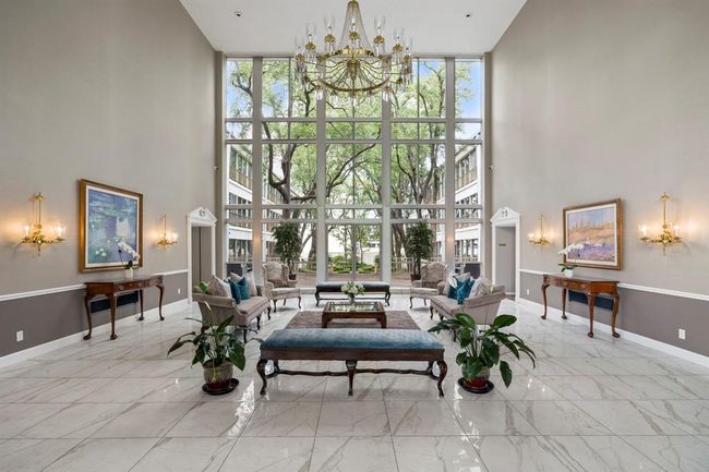 Beautiful lobby area to relax with floor to ceiling windows | Image 12