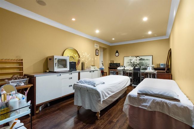 Bedroom featuring crown molding, dark wood-type flooring, and recessed lighting | Image 34