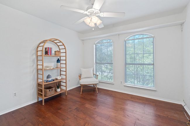 Sitting room with wood-type flooring and ceiling fan | Image 27