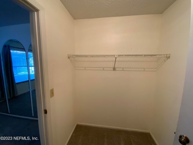 One side of the walk through closet | Image 20