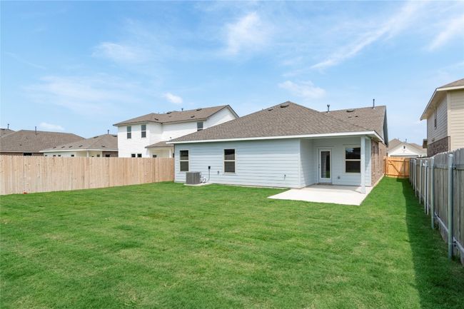 Back of house featuring a patio, a fenced backyard, and a shingled roof | Image 30