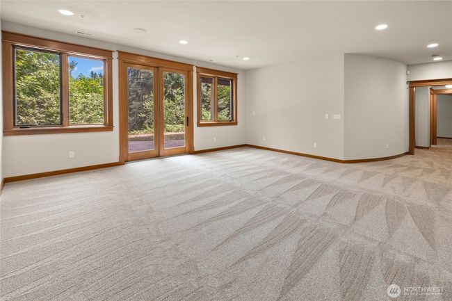 Bonus room leading outside to a nice patio area over looking the golf course | Image 27