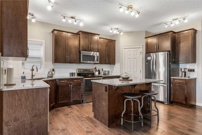 14 Walden Grove Se, Home with 3 bedrooms, 2 bathrooms and 4 parking in Calgary AB | Image 7