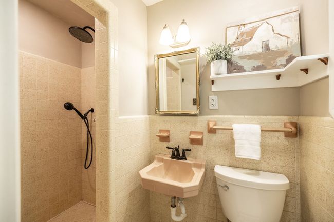 Here you will see the primary suite bath. | Image 54