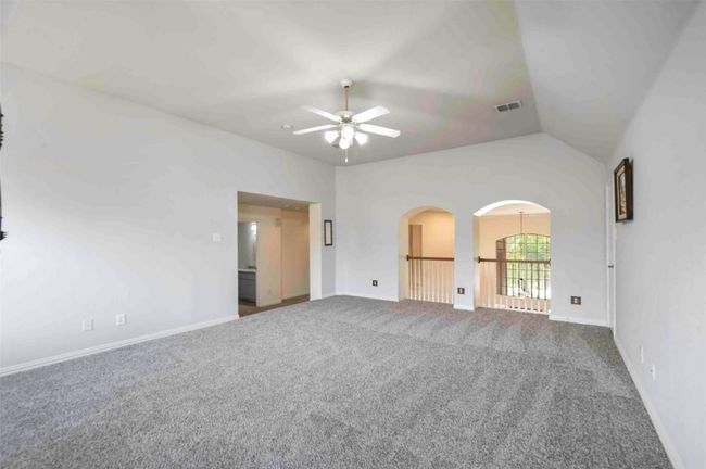 Unfurnished room featuring visible vents, ceiling fan, carpet, and baseboards | Image 16