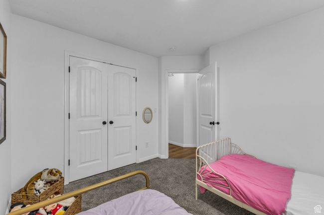 Carpeted bedroom featuring baseboards and a closet | Image 20