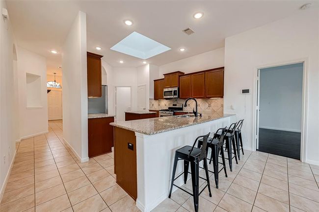 Breakfast bar open to dining space | Image 8