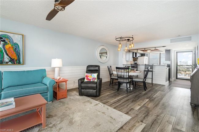 VIEW FROM LIVING AREA TOWARDS DINING, KITCHEN AND UNIT ENTRANCE | Image 5