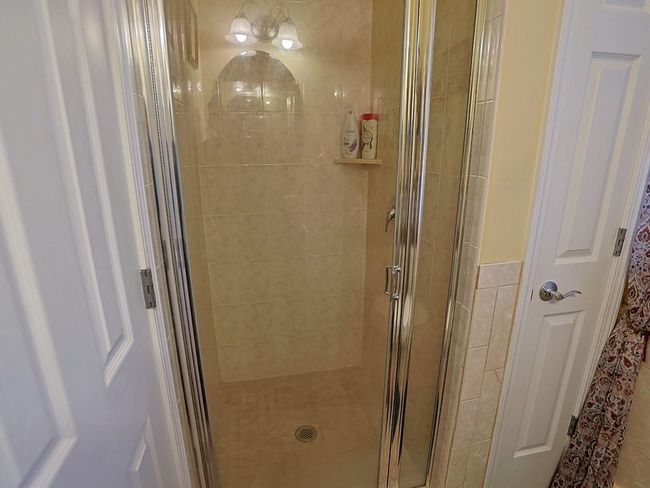 Bathroom featuring a stall shower | Image 20