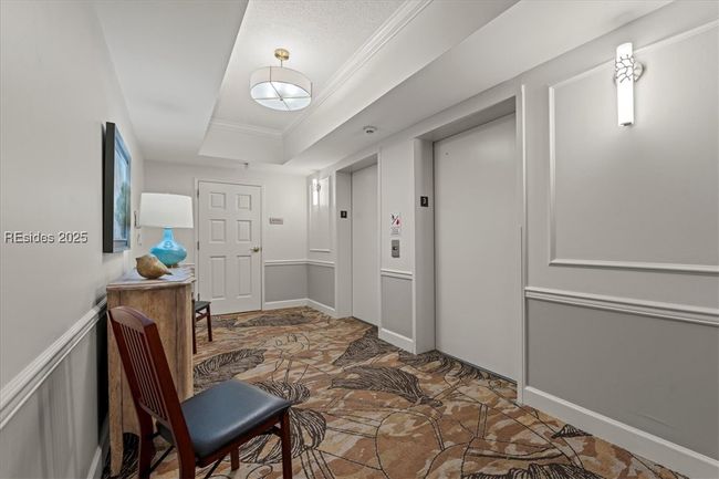 Elevator access is provided to all floors and garage. Within TidePointe - the buildings are connected with temperature-controlled hallways so that you can make your way to the clubhouse regardless of the weather! | Image 33