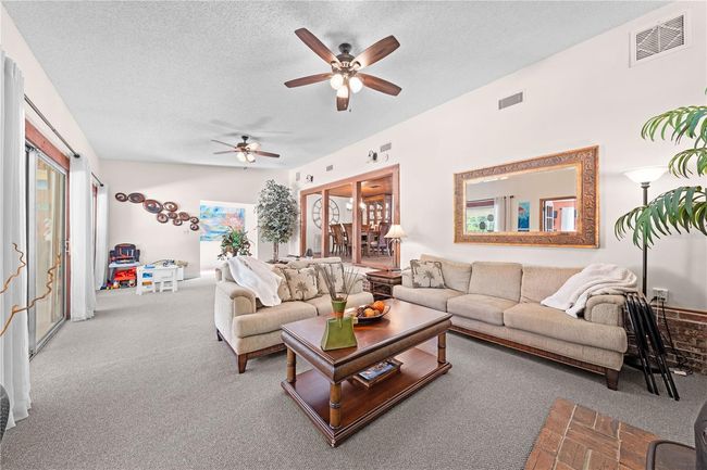 Main Home - Family Room with the view of the Dining Room | Image 37