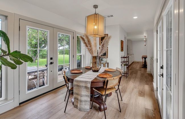 Dining area with french doors, light wood-type flooring, and recessed lighting | Image 19
