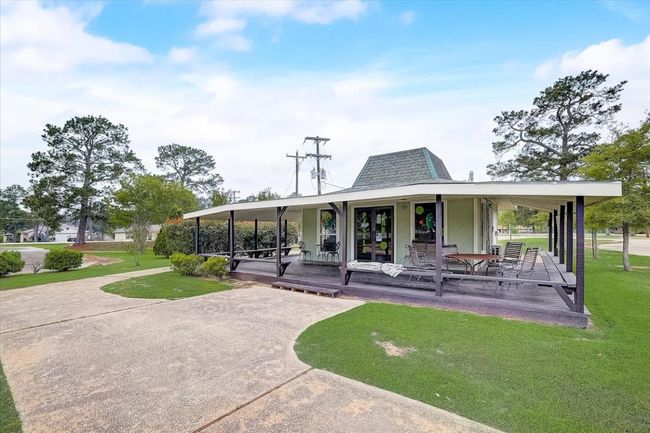 View of property's community with a yard | Image 16