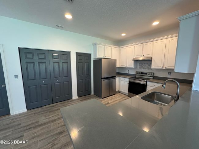 1986 Yellowfin Dr, Home with 3 bedrooms, 3 bathrooms and null parking in PORT ORANGE FL | Image 4