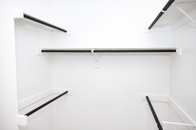 View of walk in closet | Image 10