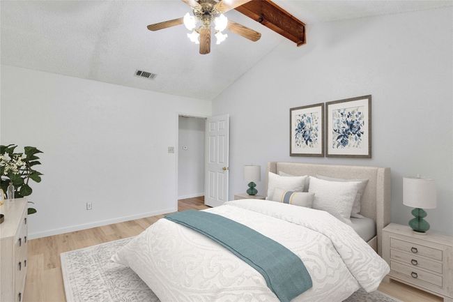 Bedroom featuring light wood finished floors and ceiling fan | Image 17