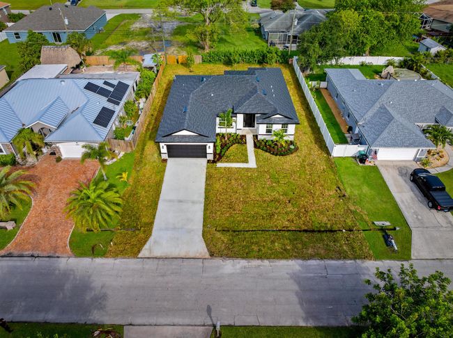 1765 Sw Columbia St, House other with 5 bedrooms, 3 bathrooms and null parking in Port St. Lucie FL | Image 34
