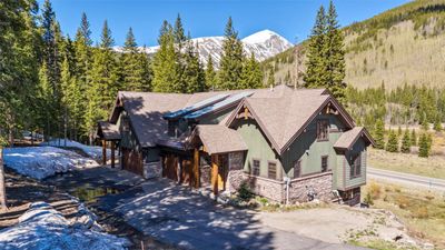 View of front of house with a garage and a mountain view | Image 2