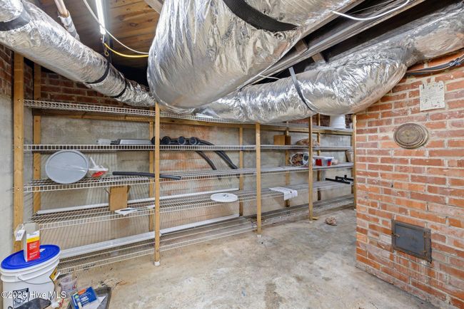 Basement located in the home perfect for more storage | Image 26