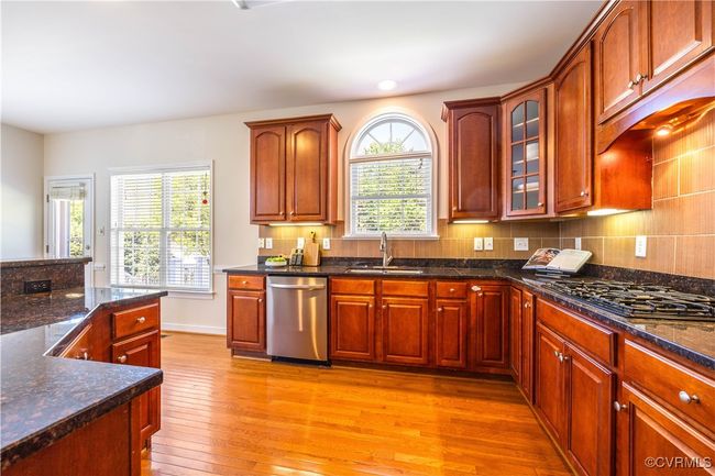 The heart of the home is this open and spacious Kitchen. | Image 11