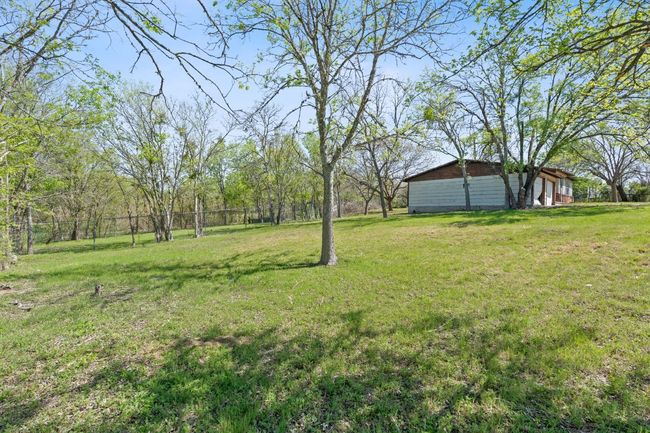 View of yard with current home. | Image 6