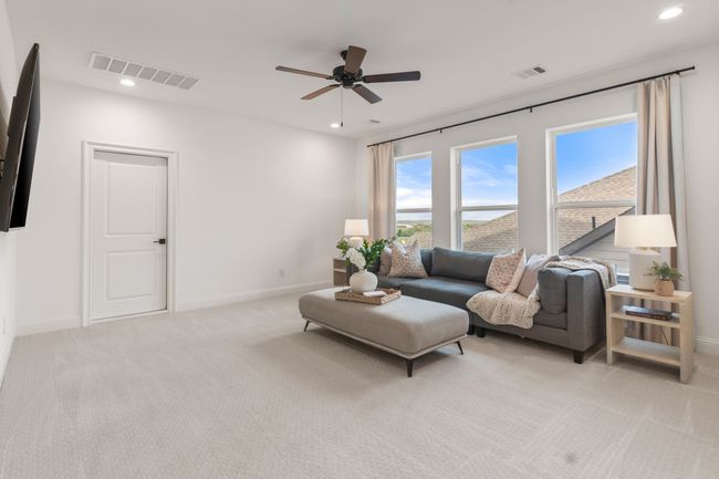 Living room featuring recessed lighting, light colored carpet, and a ceiling fan | Image 31