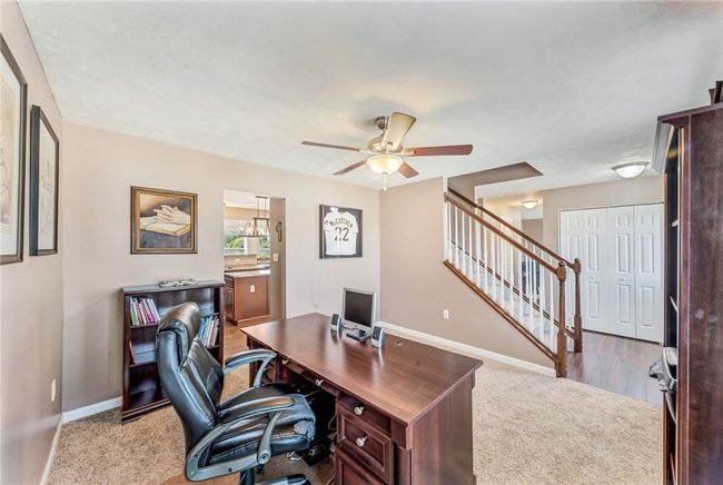 Private enough, but with a view of other rooms. This home feels so open and spacious! | Image 9