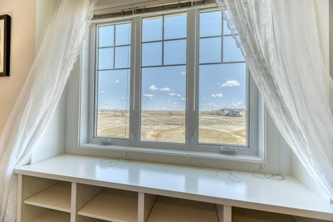 312 Boulder Creek Cres Se, House other with 3 bedrooms, 3 bathrooms and 6 parking in Langdon AB | Image 26