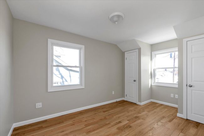 Bonus room featuring a healthy amount of sunlight and light hardwood / wood-style floors | Image 7