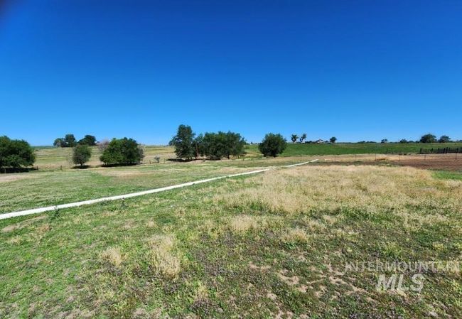 View of yard with a view of countryside | Image 10