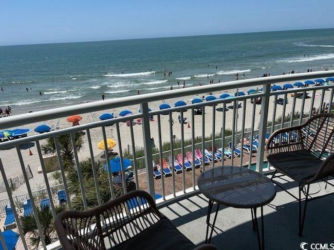 Balcony featuring view of water and beach | Image 19