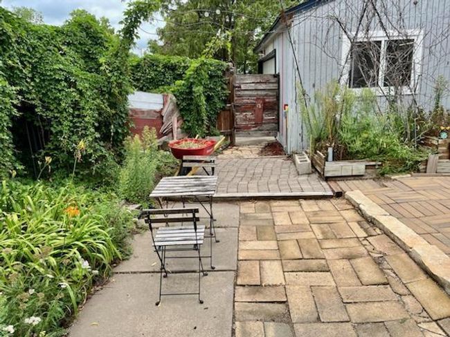 Such a charming backyard patio. | Image 25