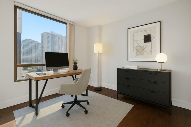 Virtual Staging - Office area with baseboards and dark wood finished floors | Image 19