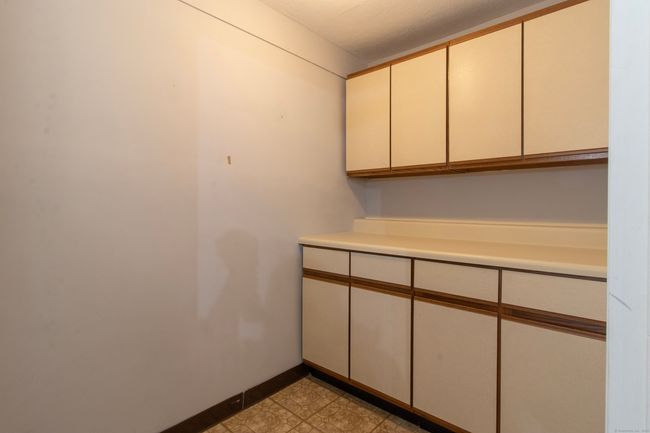 Entrance from the garage "mud room" area with storage cabinets | Image 22
