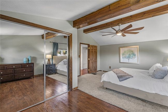 Owners bedroom with walk in closet. | Image 16